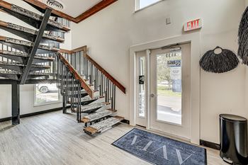 Staircase with black railing